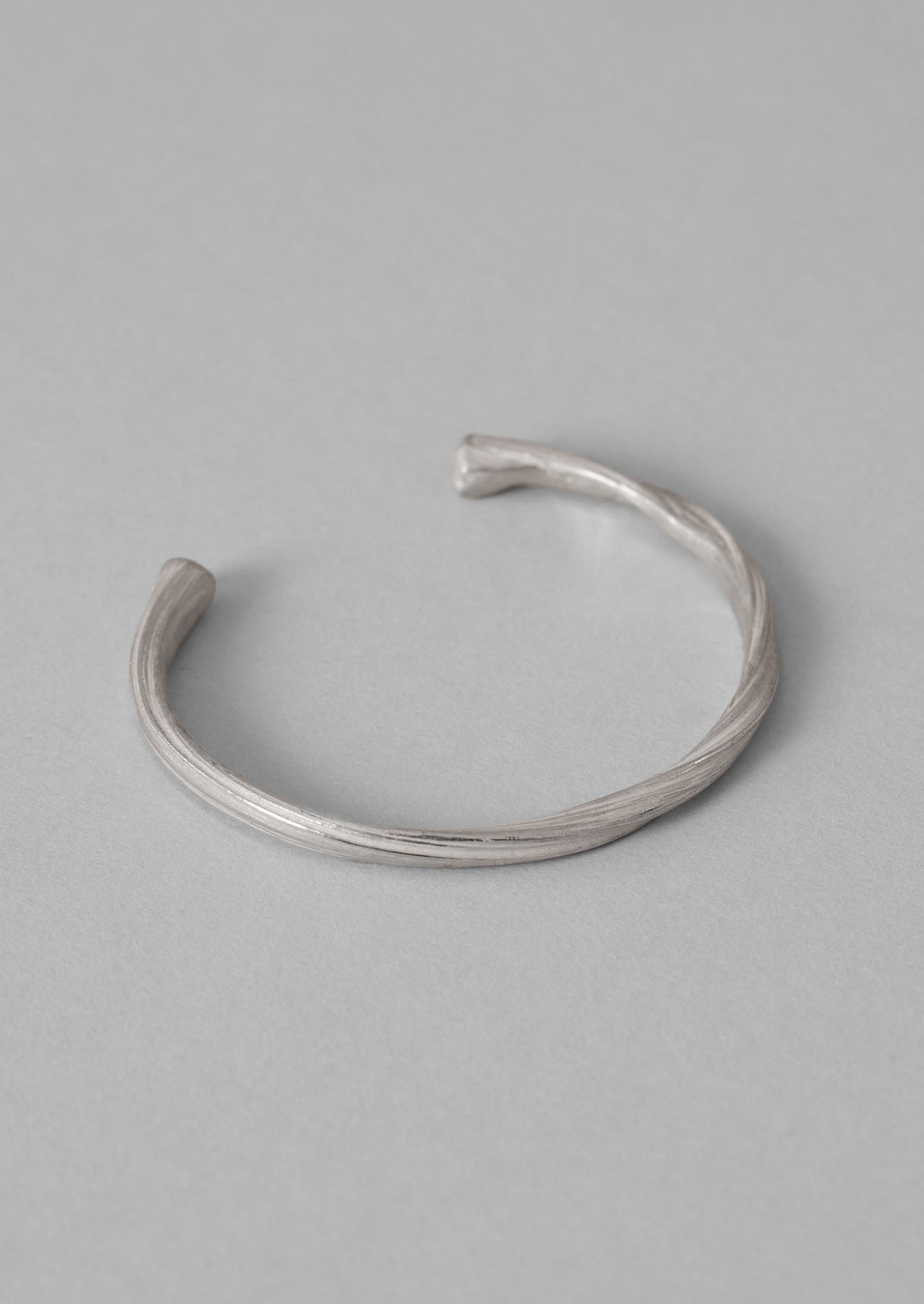 Silver Mitsuro Ribbon Bangle by Emily Nixon