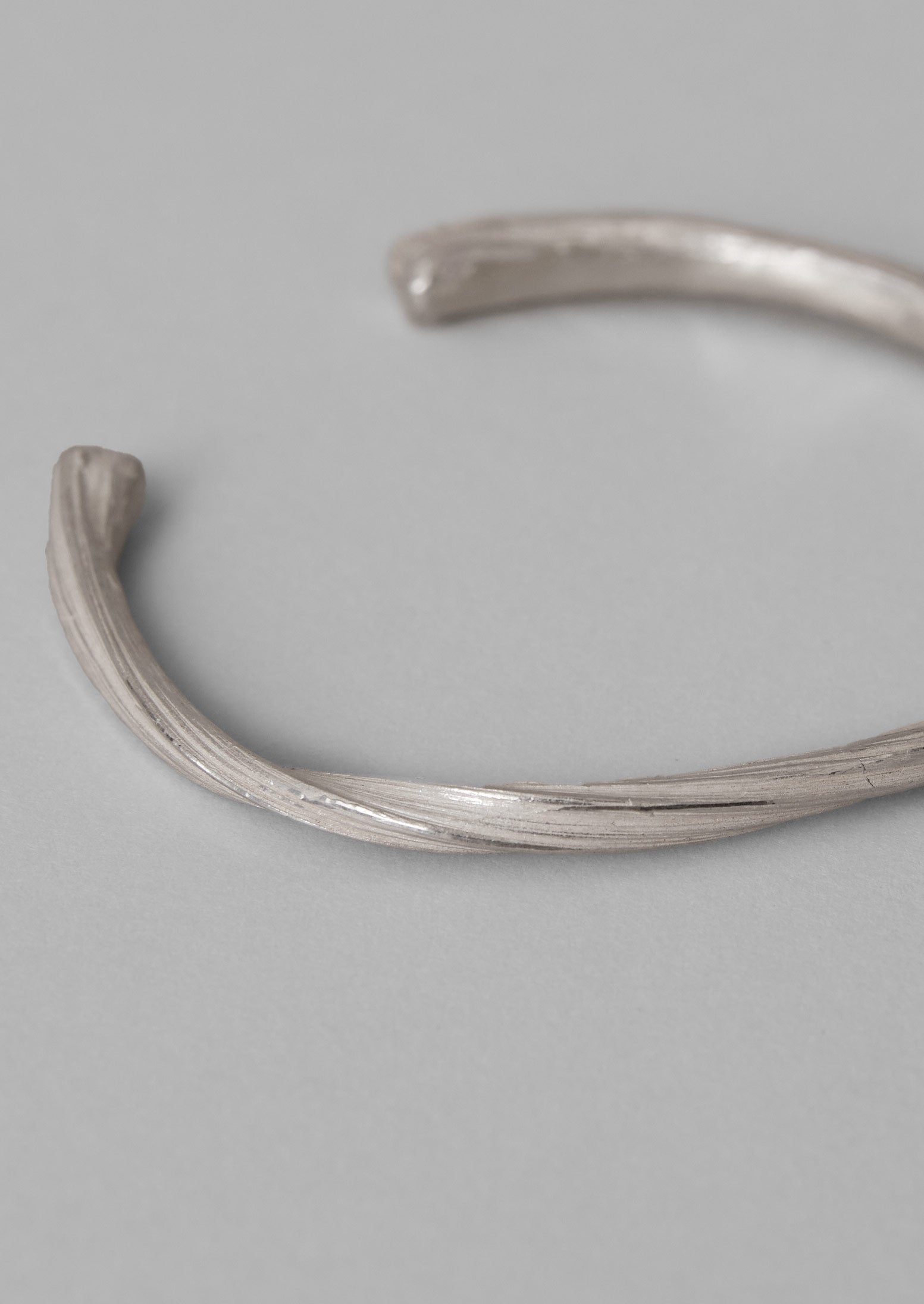Silver Mitsuro Ribbon Bangle by Emily Nixon