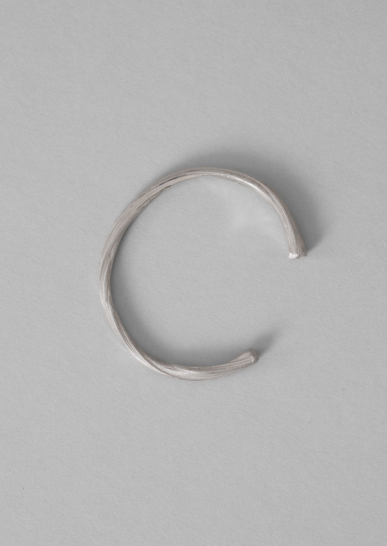 Silver Mitsuro Ribbon Bangle by Emily Nixon