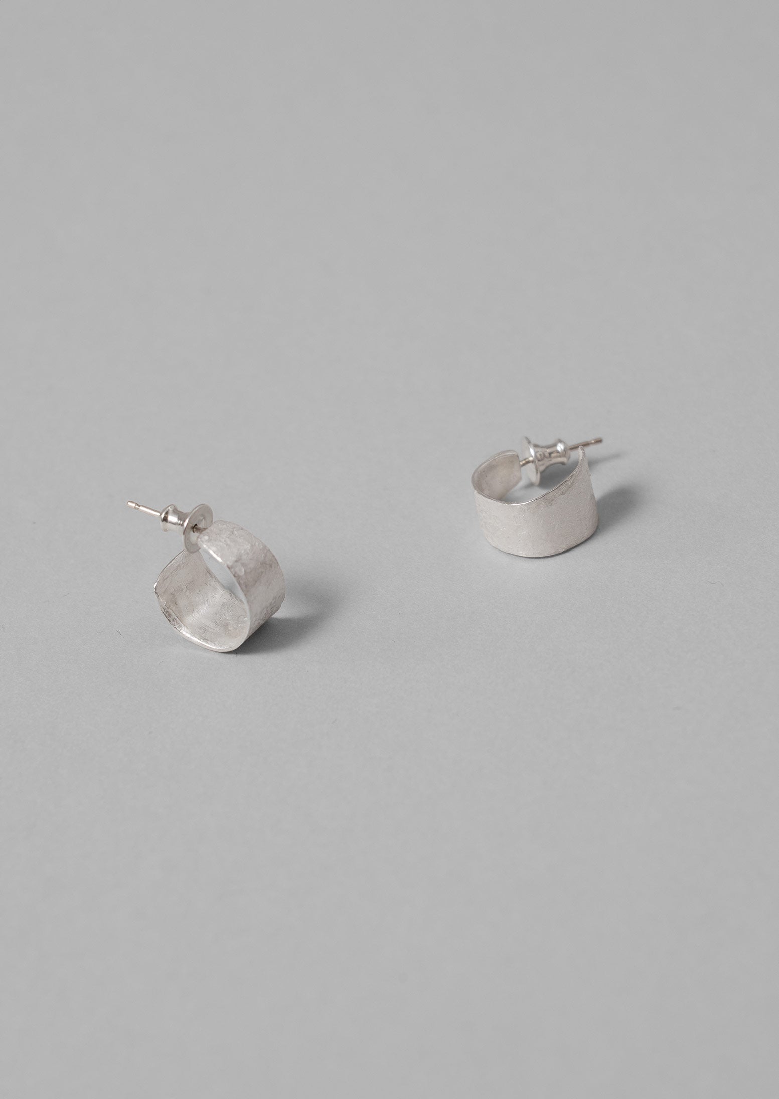 Silver Sculptural Hoop Earrings by Emily Nixon